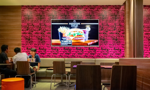 Fast food companies utilising screens to display their menus and promote - Hire Intelligence