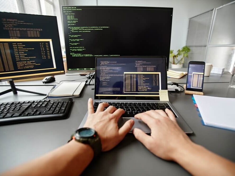 Engineer typing on keyboard Cost effectiveness and Productivity edited